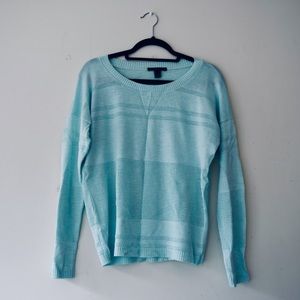 Bright turquoise sweater